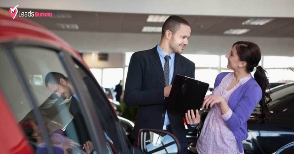 A men and women discussing about online used car leads